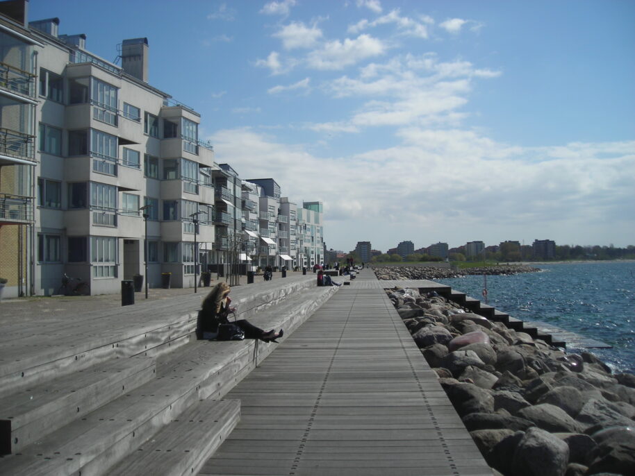 Bo01 sustainable quarter in Malmö, Sweden. The housing complex, also known as ‘City of Tomorrow’, has been realized in occasion of the European Housing Expo in 2001. The quarter is highly sustainable because of the large use of solar cells, solar thermal collector and other renewable sources. But is this kind of housing really possible for 7,000,000,000 people in the world? © Author